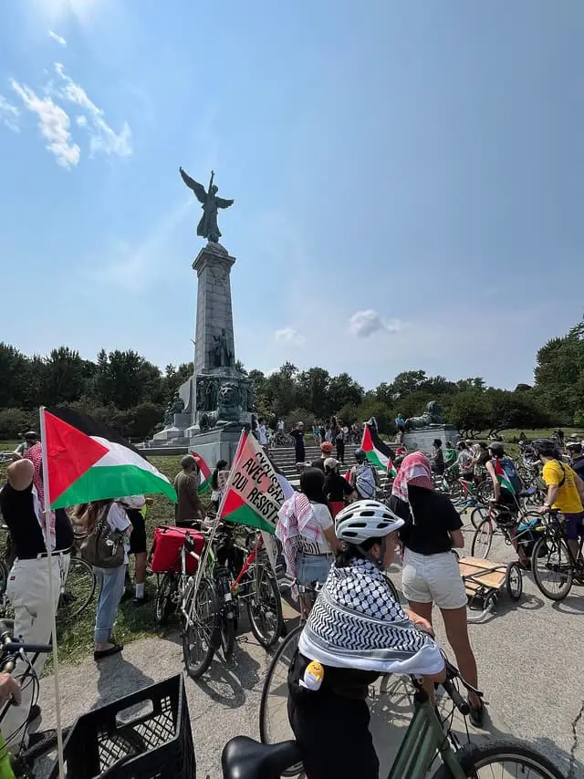 Cyclists gathered at the George-Étienne Cartier Monument for Critical Mass in 2025; an earlier gathering.