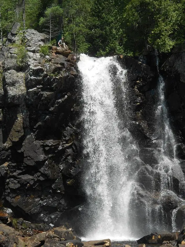 Chute-à-Bull waterfall dropping over a rocky ledge.