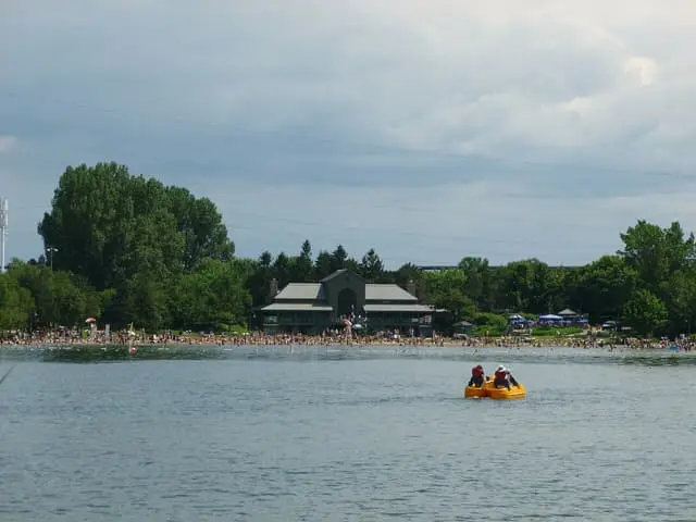 Jean-Doré beach and a pedal boat seen from the water.